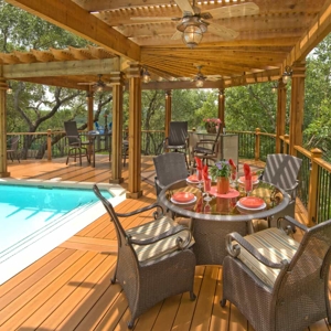 L-Shaped Wood Pergola Over Pool Deck